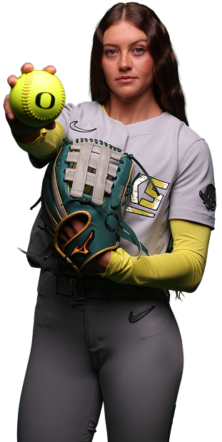 softball player holding a softball with an O on it