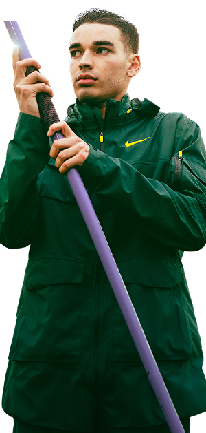 a track athlete holding a pole