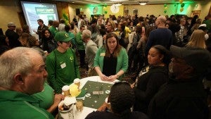 Prospective students, their families, and UO leadership mingle during the admissions event.
