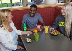 Students dining at a table Students dining at a table