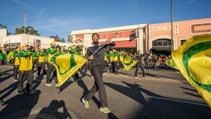 Oregon flag corp marching in the Rose Parade
