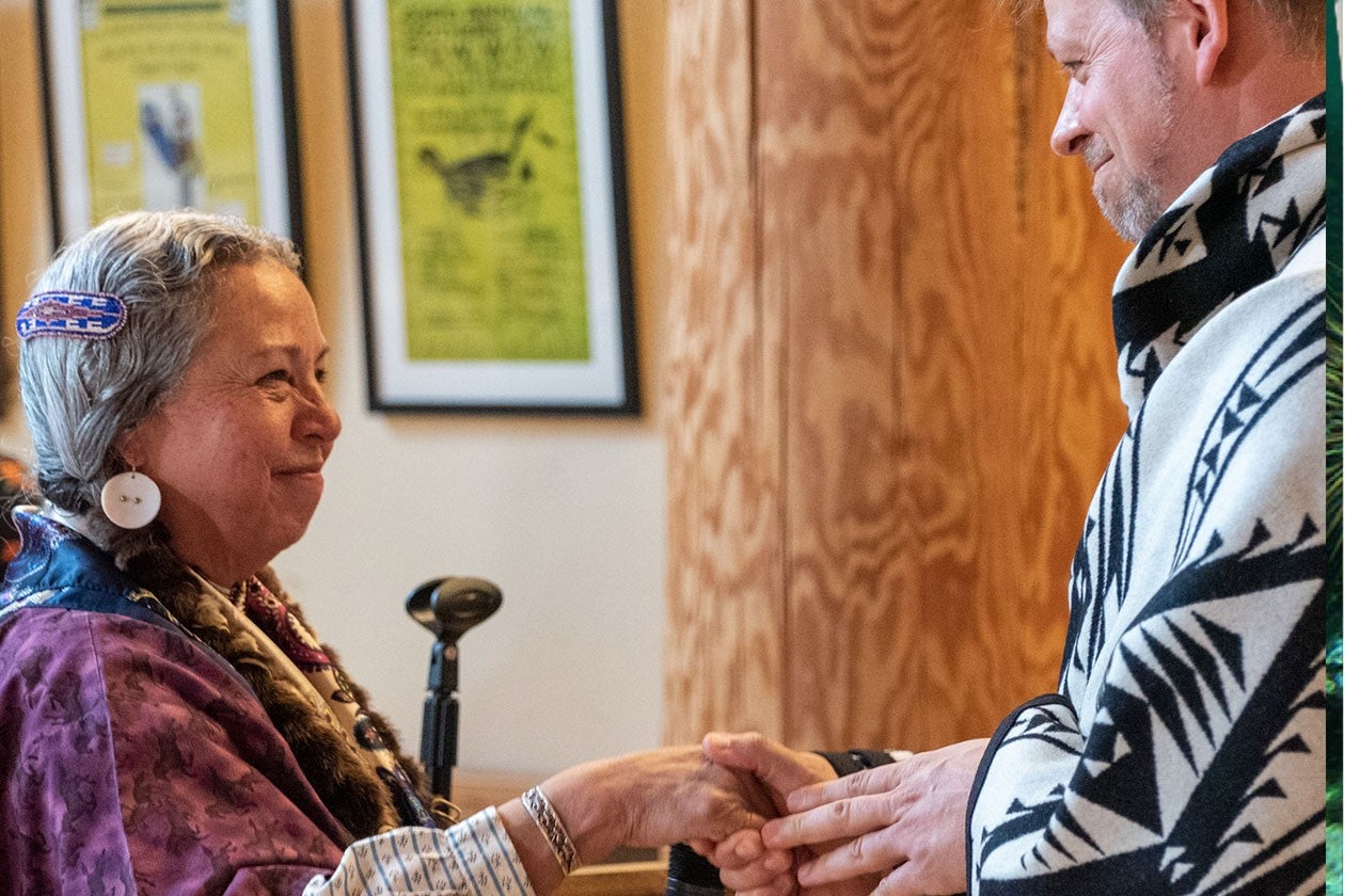 Bobbie Conner, director of the Tamástslikt Cultural Institute, presented a blanket to Michael Moffitt at the Many Nations Longhouse on June 3, 2022.