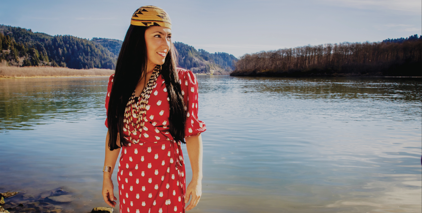 Attorney Amy Bowers Cordalis standing in front of a lake