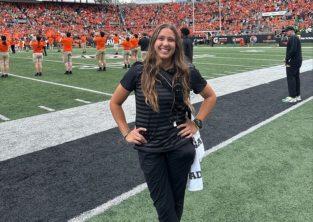 Ally Smith on the sidelines at a football game
