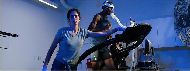 scientists take data on an athlete