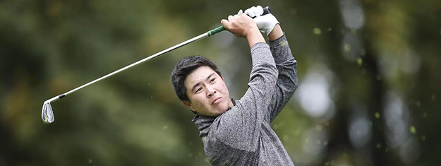 golfer swinging a club