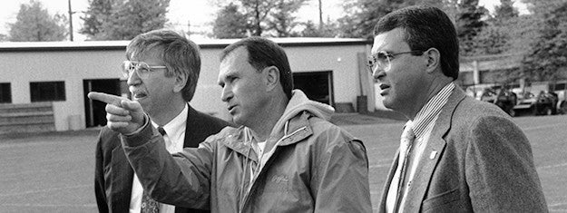 University of Oregon President Myles Brand, head football coach Rich Brooks, and athletic director Bill Byrne taken in 1990