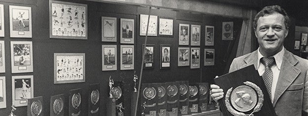 Bill Dellinger with trophies