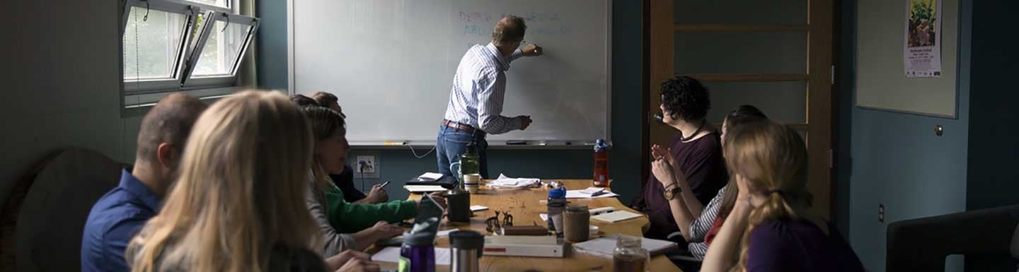 Faculty member teaching in a classroom