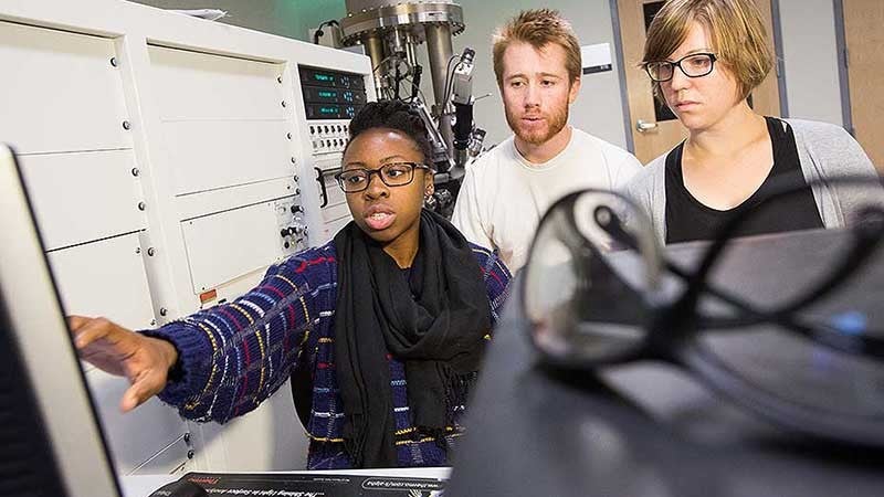 Students working on a computer in Lokey Lab