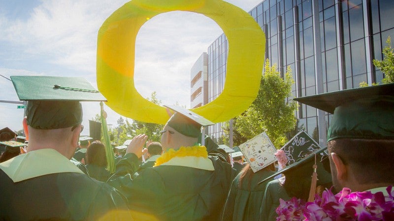 students at uo graduation ceremony