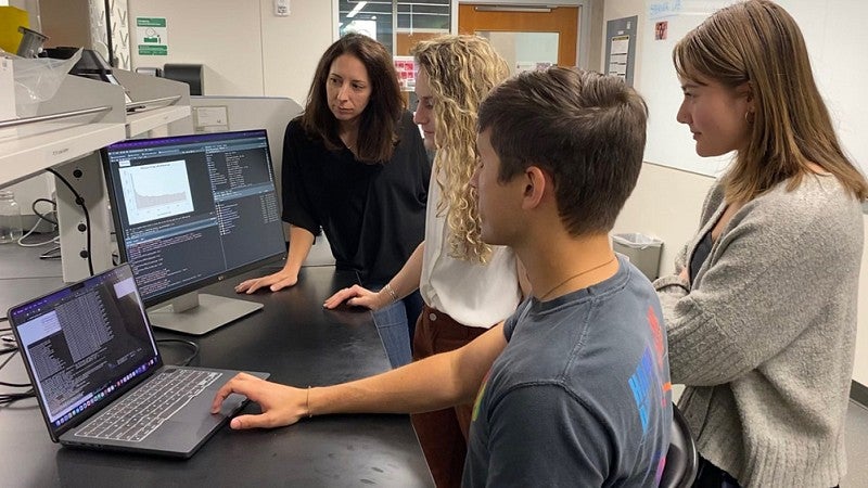 students looking at a computer