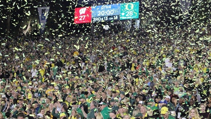 Duck fans cheering as confetti rains down after the Rose Bowl