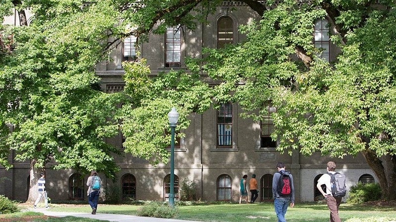 Green is one of our favorite colors. Yellow is another. Students walking through campus