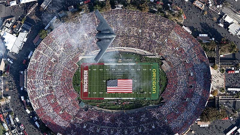 B-2 bomber flying over Rose Bowl stadium