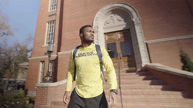 Sean Killpatrick walking out of Chapman Hall