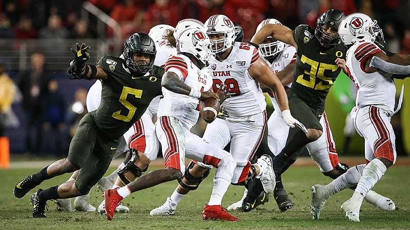 Kayvon Thibodeaux sacking Utah quarterback Tyler Huntley in the Pac-12 Championship Game