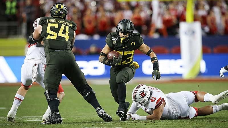 Calvin Throckmorton making a block in the Pac-12 Championship Game