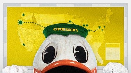 The Oregon Duck mascot peeking into the frame