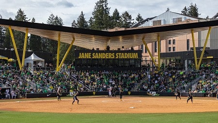 A softball game being played on Jane Sanders Stadium