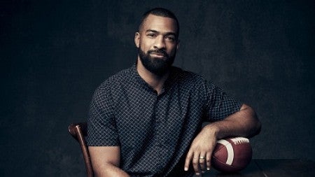 Spencer Paysinger with a football