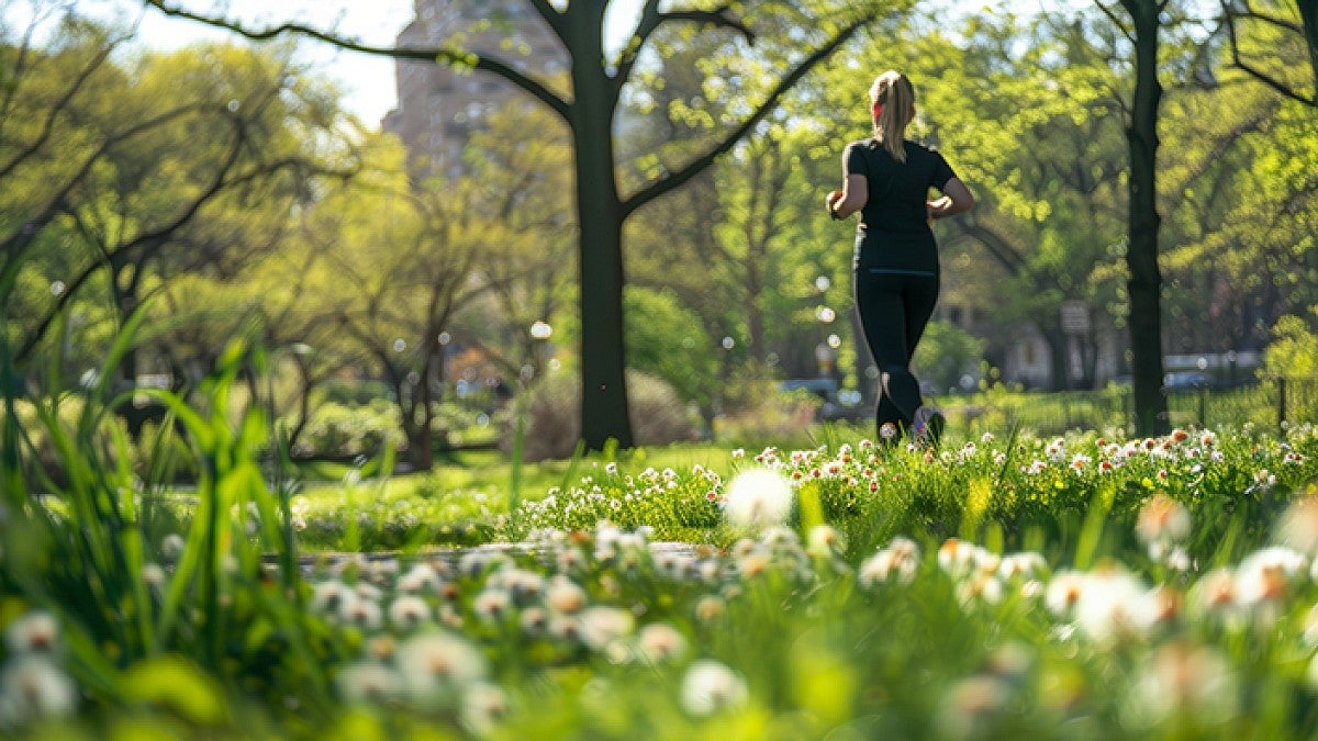 A person runs through a field