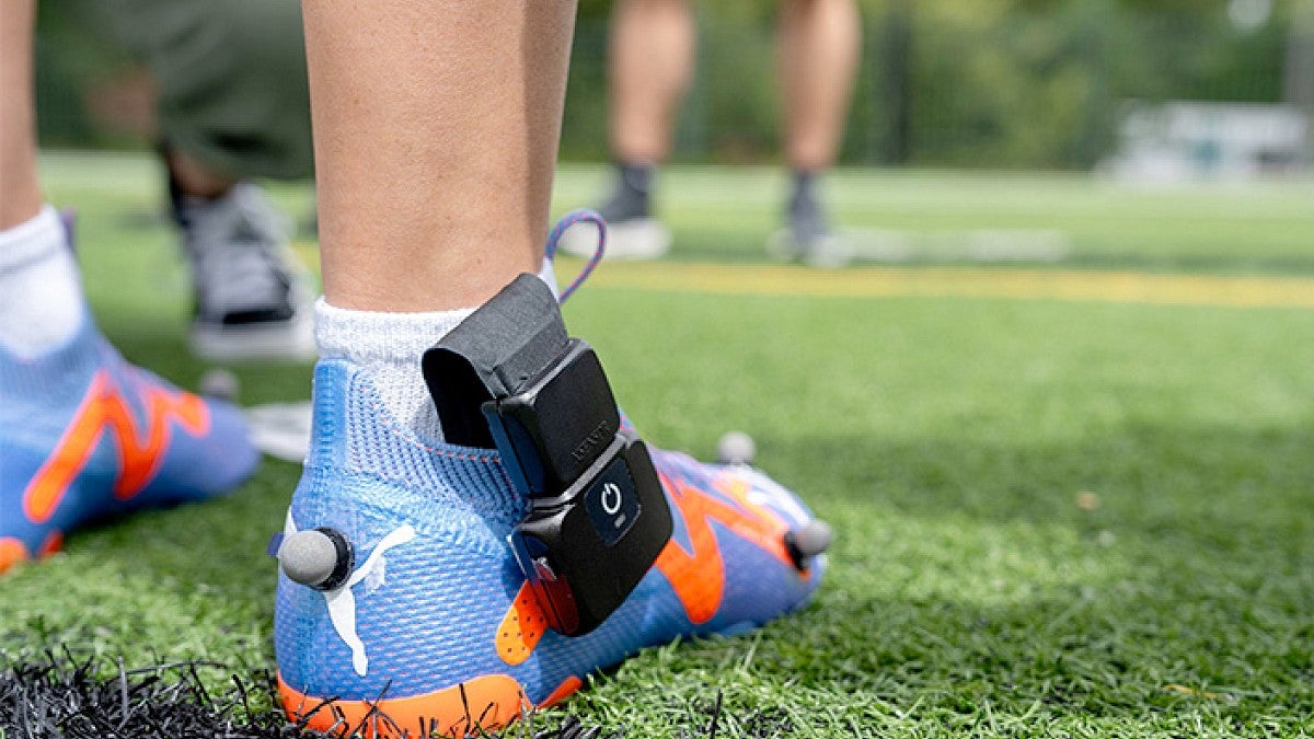 a soccer shoe with an attached sensor