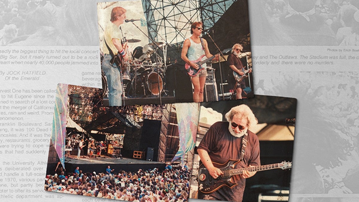 Members of the Grateful Dead playing music on stage at Autzen Stadium