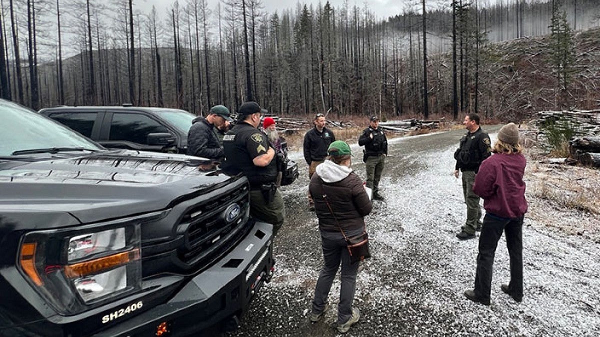 students standing in a wilderness area