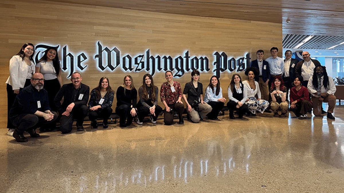 students pose for a picture at The Washington Post