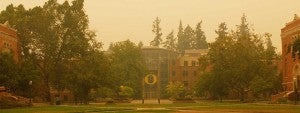 Looking at the Lillis Buisness Complex from the Memorial Quad in a smokey haze