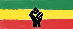 Black History Month 2021 over green, yellow, and red stripes behind a black fist
