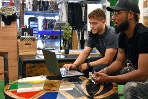 Skyler Foreman, a product design student, and Jordan Carter, an owner at Produce Portland