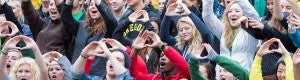 Students throwing the O at a football game