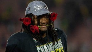 Jordon Scott with roses in his mouth after the game