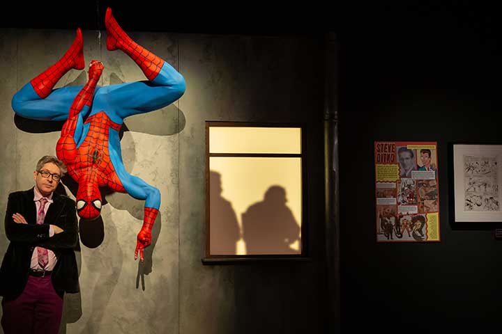 Ben Saunders with Spiderman handing upside down